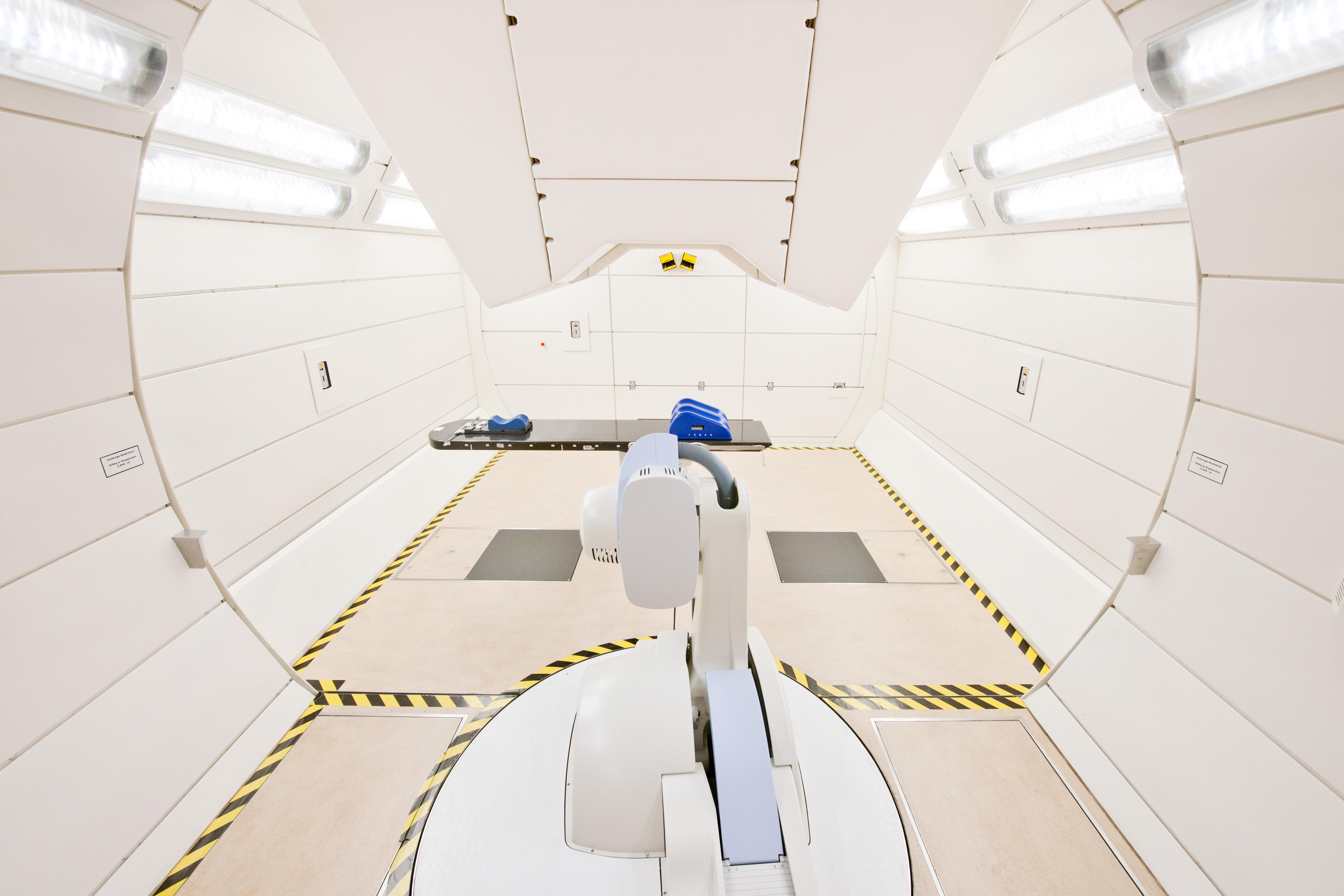View into a radiotherapy room with a gantry