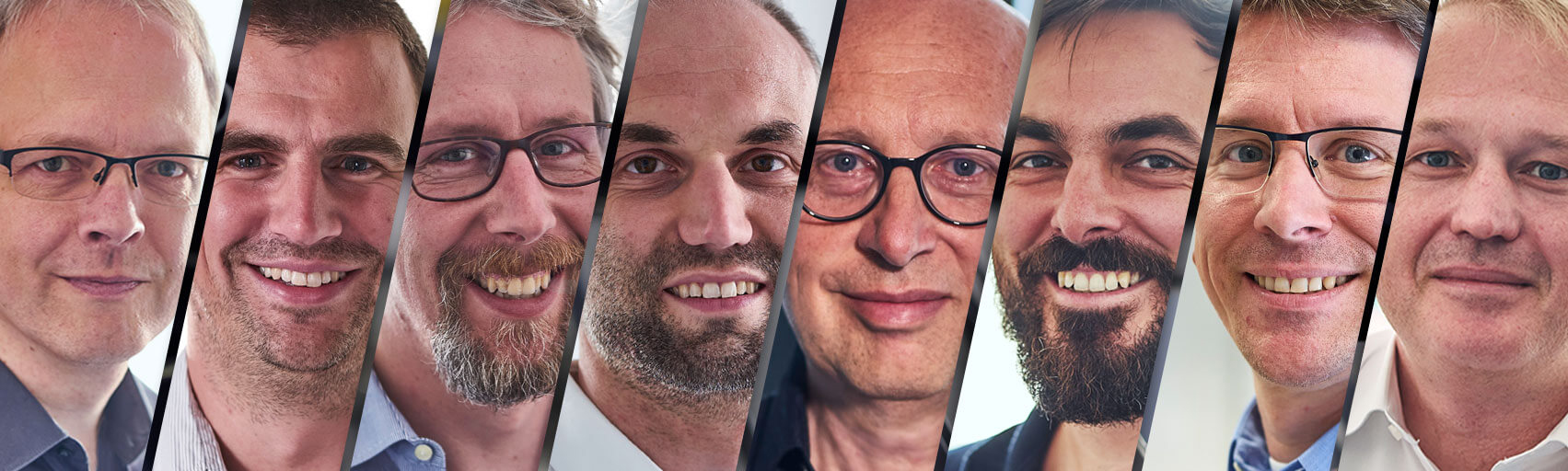 Closely juxtaposed portrait photos of the 8 founders of abberior, cropped at an angle.