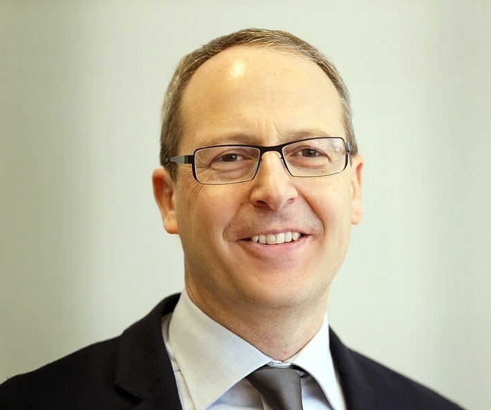 Das Porträt-Bild zeigt Dr. Markus Dachtler – Gründer und Geschäftsführer der DiHeSys.