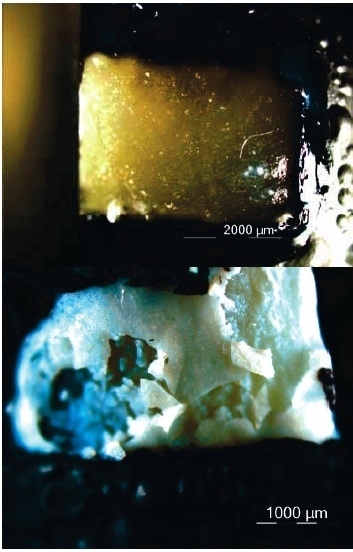 The figure shows to photos depicting two "crystal-like" structures, one in yellow (top) and one in blue-white (bottom).