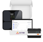 The photo shows a body scale and the user interface of the app on the tablet. Furthermore, a bag and the ECG measuring device can be seen.