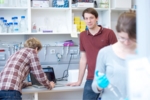 The photo shows Dr. Summerer and two of his colleagues in the laboratory.
